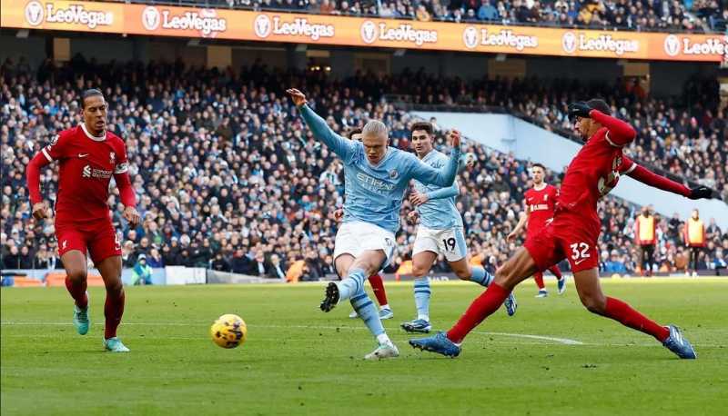     Manchester City vs Liverpool 1-1: Erling Haaland menyumbang gol untuk The Cityzens sekaligus mencetak rekor pemain tercepat mencetak 50 gol di Premier League hanya dalam 48 pertandingan saja (premierleague.com)