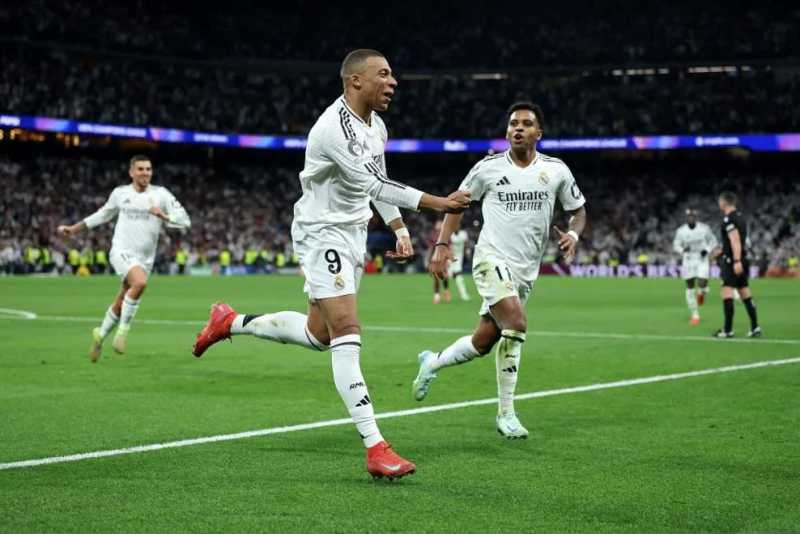     Real Madrid vs Manchester City: Kylian Mbappe mencetak hattrick saat Los Blancos menang 3-1 di leg kedua playoff Liga Champions (uefa.com)